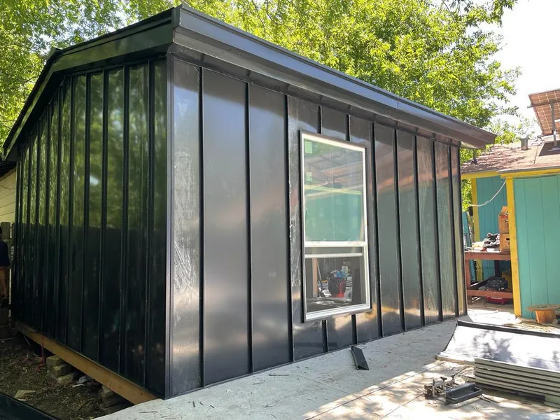 Black standing seam metal wall panels for Metal Roof Installation in Great Neck Plaza